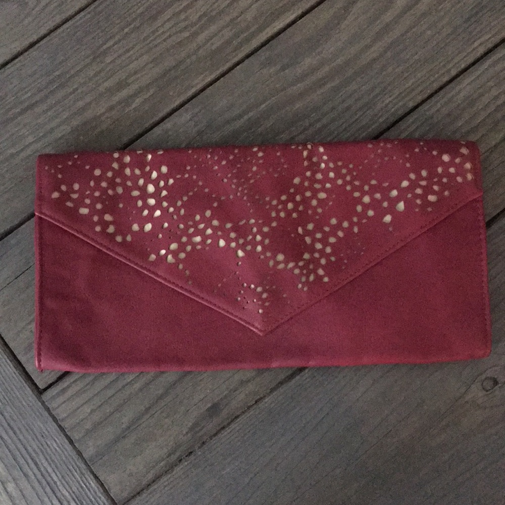 Burgundy and gold cut-out clutch